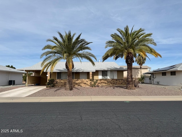 11189 W Cameo Dr, Sun City, AZ 85351 - view of front facade featuring central air condition unit and a carport