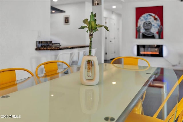 6747 N 12th St, Phoenix, AZ 85014 - dining room with a glass covered fireplace