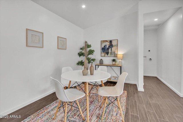 6747 N 12th St, Phoenix, AZ 85014 - dining space featuring baseboards, wood tiled floor, and recessed lighting