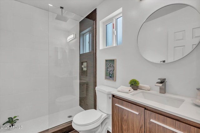 6747 N 12th St, Phoenix, AZ 85014 - bathroom featuring toilet, a walk in shower, and vanity