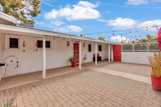 6747 N 12th St, Phoenix, AZ 85014 - exterior space featuring stucco siding and a patio