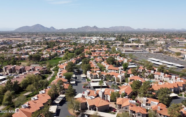 birds eye view of property with a residential view and a mountain view