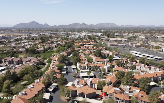 drone / aerial view featuring a residential view and a mountain view