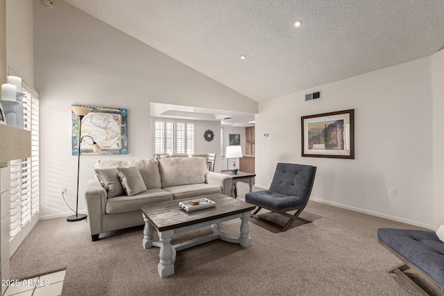 living area featuring carpet, visible vents, a textured ceiling, and baseboards