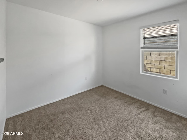 empty room featuring carpet floors