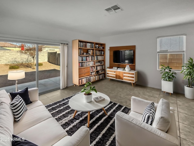 living room with light tile patterned flooring