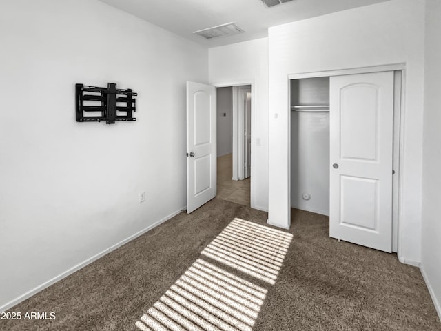 carpeted bedroom with a closet