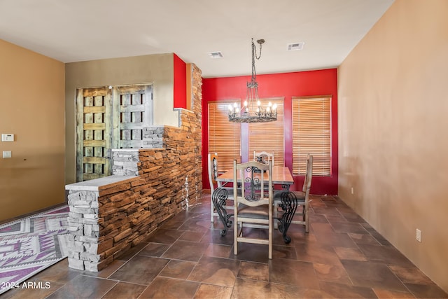 15406 E Cavedale Dr, Scottsdale, AZ 85262 - dining area featuring a chandelier and dark stone finish floors