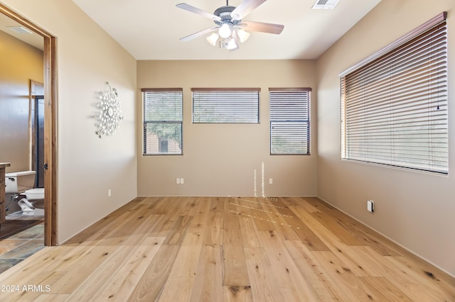 15406 E Cavedale Dr, Scottsdale, AZ 85262 - spare room with light wood-type flooring and ceiling fan