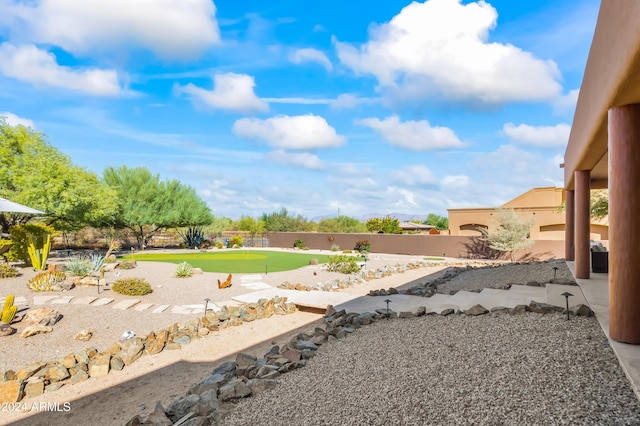 15406 E Cavedale Dr, Scottsdale, AZ 85262 - fenced backyard with a putting area and a patio area