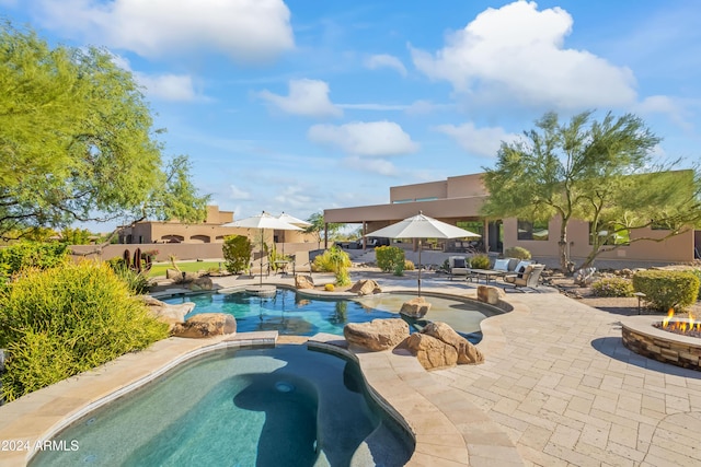 15406 E Cavedale Dr, Scottsdale, AZ 85262 - view of swimming pool with an outdoor fire pit, a patio area, and a pool with connected hot tub