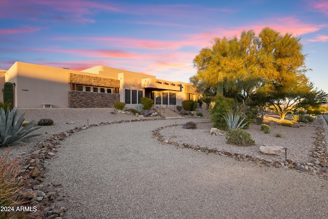 15406 E Cavedale Dr, Scottsdale, AZ 85262 - adobe home featuring stucco siding and stone siding