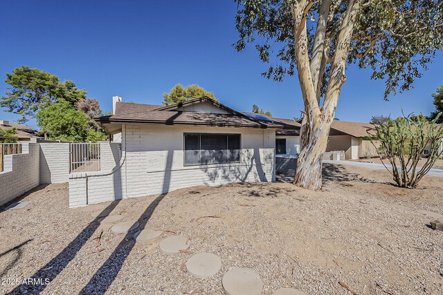 16421 N 34th Ave, Phoenix, AZ 85053 - ranch-style house with solar panels and stucco siding