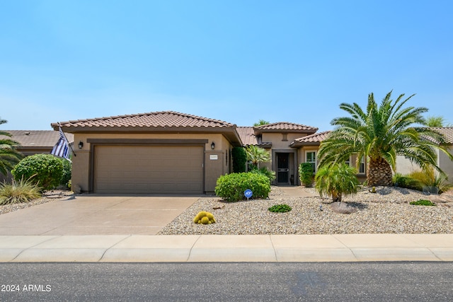 view of front of home with a garage