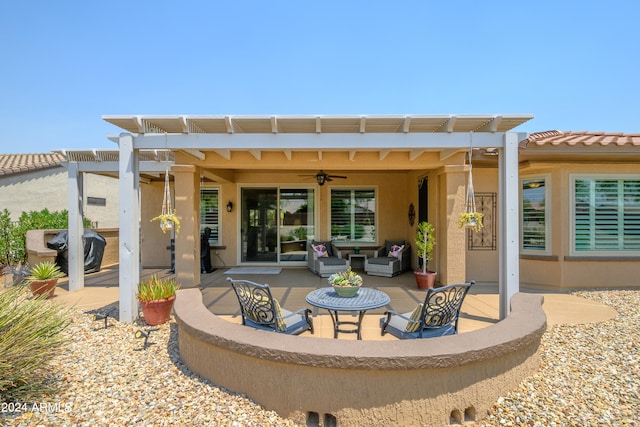 rear view of house featuring a pergola, a patio, an outdoor hangout area, and ceiling fan