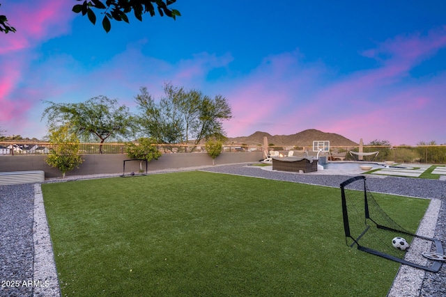 9527 W Whitehorn Way, Peoria, AZ 85383 - yard at dusk featuring a patio