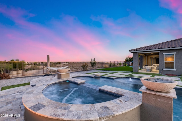 9527 W Whitehorn Way, Peoria, AZ 85383 - view of pool with a patio area, a fenced backyard, and a pool with connected hot tub
