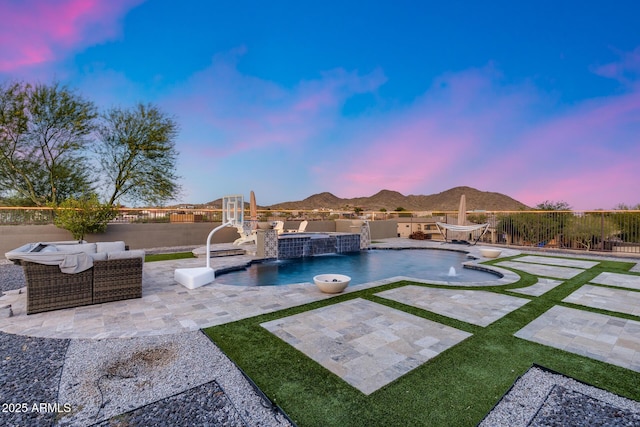 9527 W Whitehorn Way, Peoria, AZ 85383 - view of swimming pool with a patio, a fenced backyard, an outdoor hangout area, and a mountain view