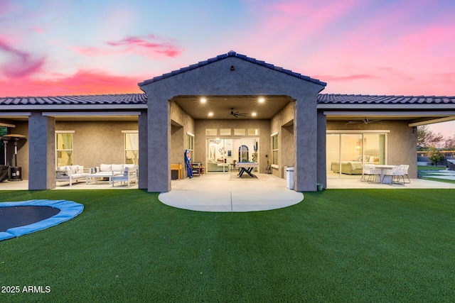 9527 W Whitehorn Way, Peoria, AZ 85383 - rear view of property with an outdoor hangout area, a ceiling fan, a patio area, and a yard