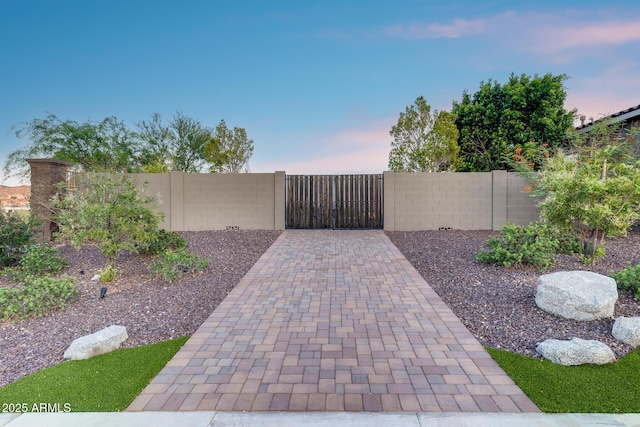 9527 W Whitehorn Way, Peoria, AZ 85383 - view of gate at dusk