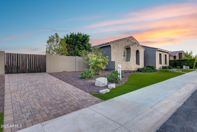 9527 W Whitehorn Way, Peoria, AZ 85383 - view of front of house with stucco siding and driveway