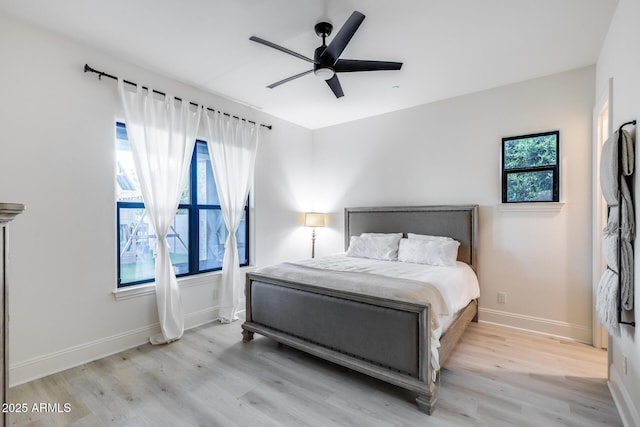 9527 W Whitehorn Way, Peoria, AZ 85383 - bedroom featuring light wood-style flooring, baseboards, and a ceiling fan
