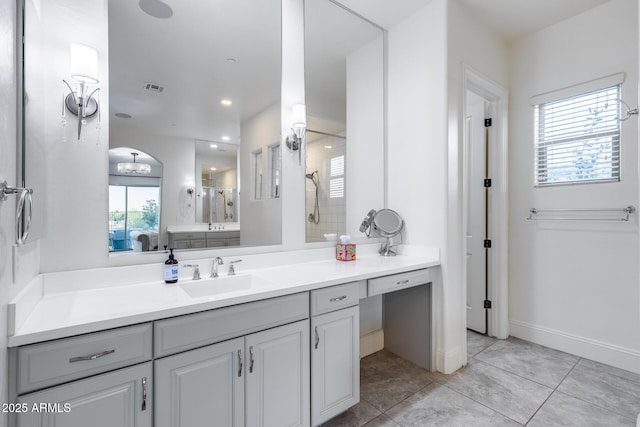 9527 W Whitehorn Way, Peoria, AZ 85383 - bathroom with vanity, walk in shower, tile patterned floors, and baseboards