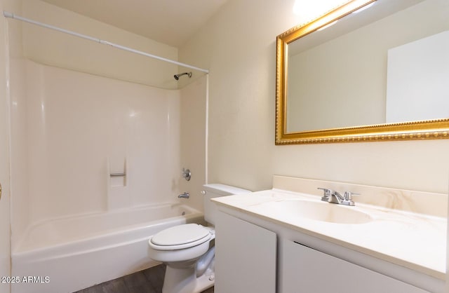 full bath featuring vanity, toilet, and shower / washtub combination