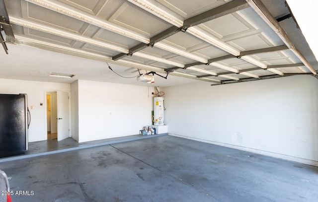 garage with a garage door opener, water heater, and freestanding refrigerator