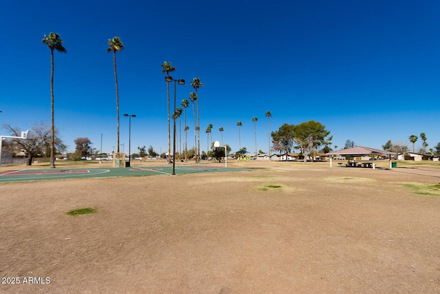 view of home's community with community basketball court