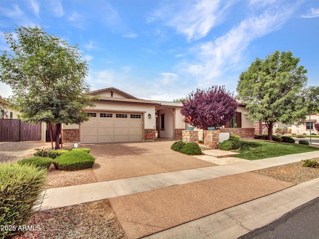 3809 E Lynx Pl, Chandler, AZ 85249 - view of front of property featuring an attached garage, concrete driveway, stucco siding, and stone siding