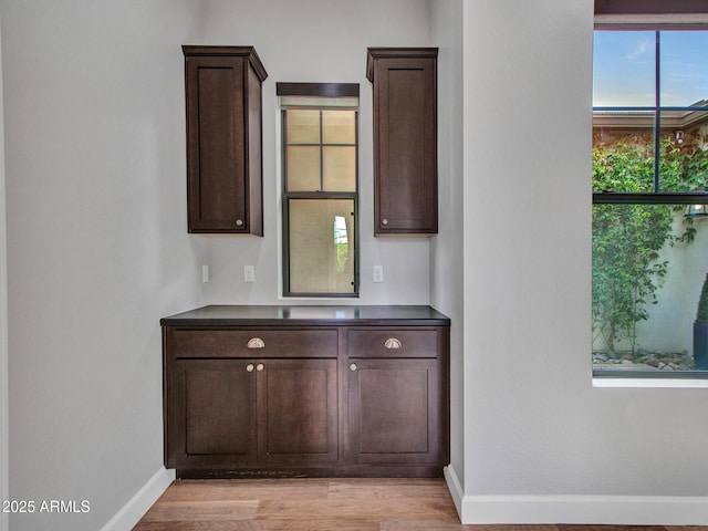 3809 E Lynx Pl, Chandler, AZ 85249 - bar featuring baseboards and light wood-type flooring
