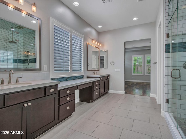 3809 E Lynx Pl, Chandler, AZ 85249 - bathroom with vanity, a stall shower, recessed lighting, tile patterned flooring, and baseboards