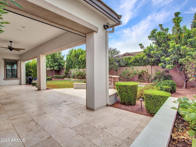 3809 E Lynx Pl, Chandler, AZ 85249 - fenced backyard with a ceiling fan and a patio area
