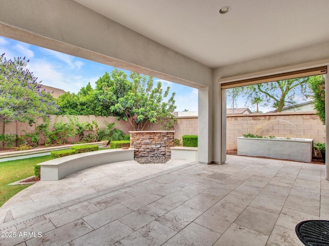 3809 E Lynx Pl, Chandler, AZ 85249 - fenced backyard with a patio area