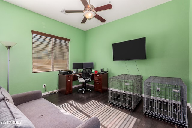 home office featuring ceiling fan and dark hardwood / wood-style flooring