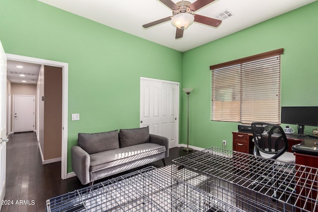 office with hardwood / wood-style flooring and ceiling fan