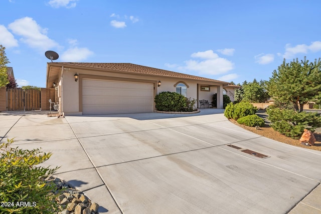 mediterranean / spanish house with a garage