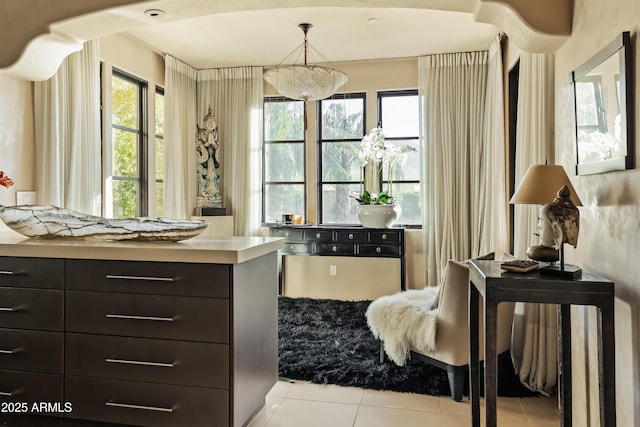 spacious closet featuring light tile patterned floors