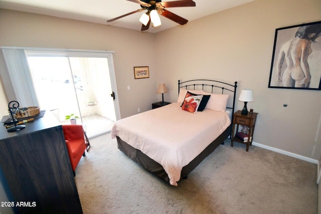 5345 E Van Buren St Unit 115, Phoenix, AZ 85008 - bedroom with carpet, baseboards, a ceiling fan, and access to outside