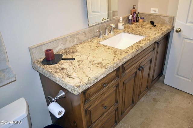 5345 E Van Buren St Unit 115, Phoenix, AZ 85008 - bathroom with vanity and toilet