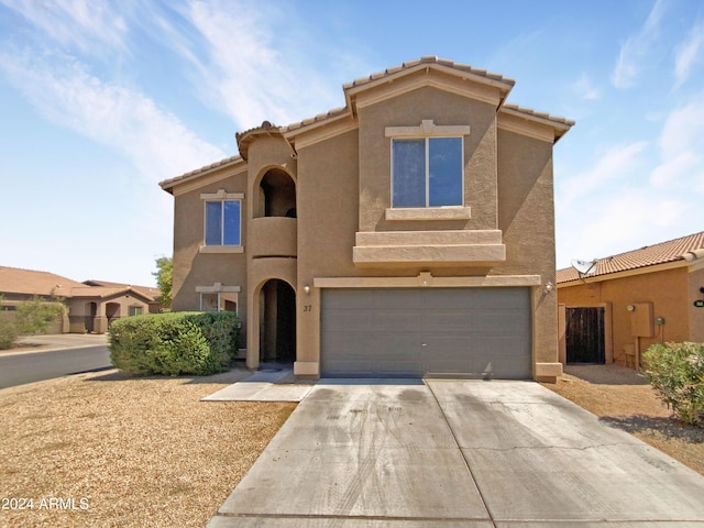 view of front of property with a garage