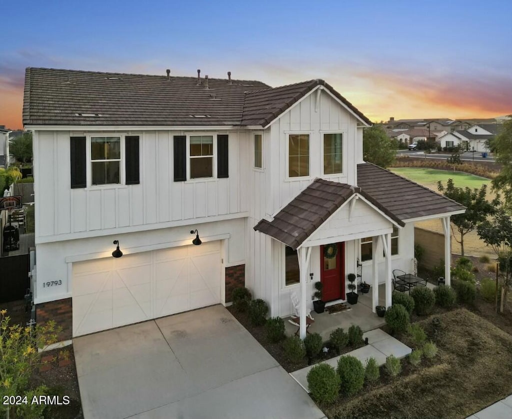 view of front of property with a garage