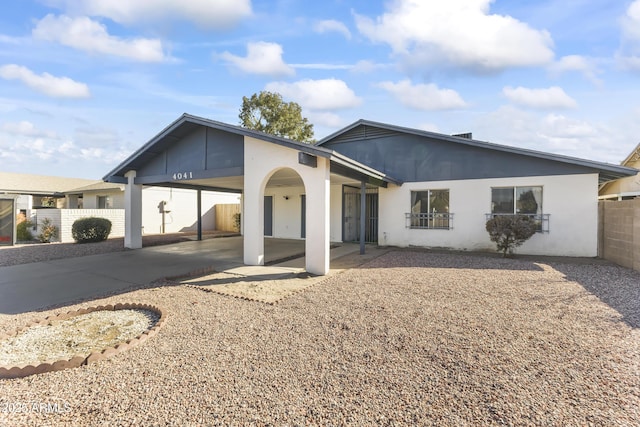 view of front of house with a carport