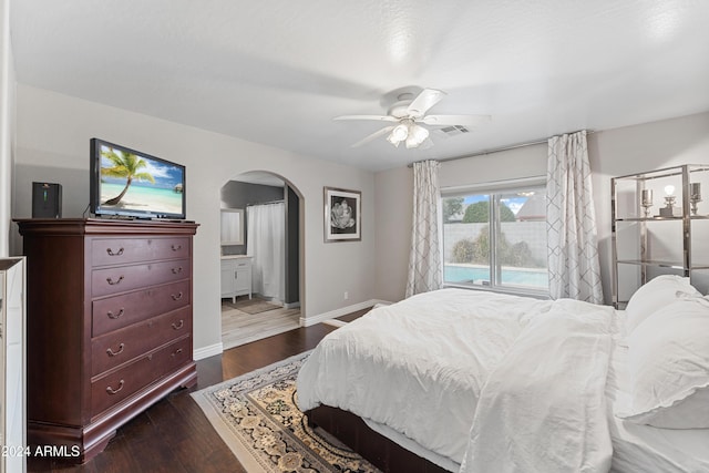 bedroom with ceiling fan and dark hardwood / wood-style flooring