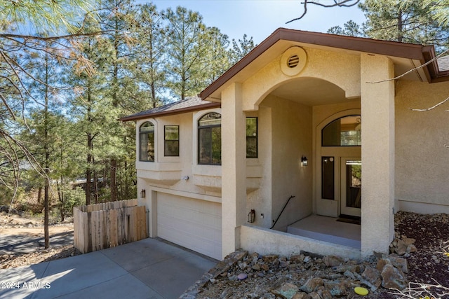 view of front of home with a garage