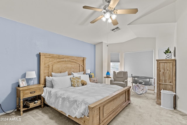 3211 E Kerry Ln, Phoenix, AZ 85050 - bedroom with visible vents, vaulted ceiling, a ceiling fan, and light carpet