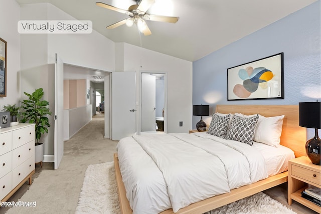 3211 E Kerry Ln, Phoenix, AZ 85050 - bedroom featuring ensuite bathroom, ceiling fan, vaulted ceiling, and light colored carpet