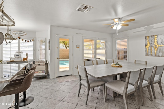 3211 E Kerry Ln, Phoenix, AZ 85050 - dining room with light tile patterned flooring, baseboards, visible vents, and a ceiling fan