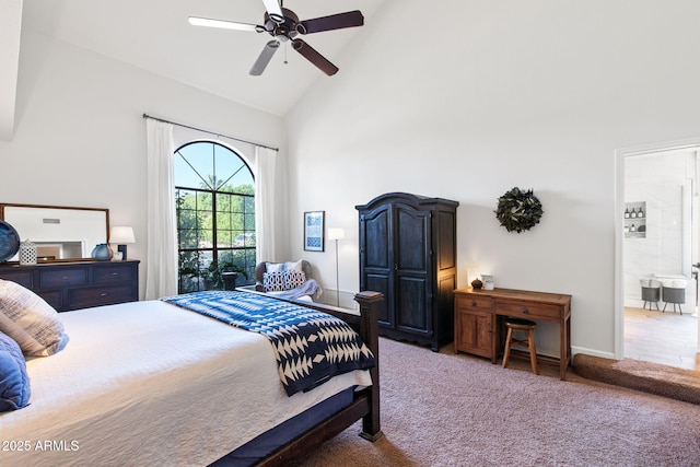 carpeted bedroom featuring high vaulted ceiling and ceiling fan